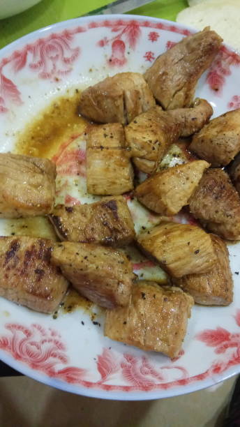 istock Pork chops wok fried, close-up, no people 989219110