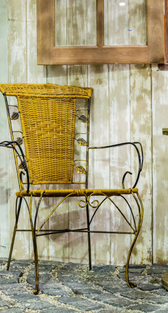 istock Old wicker rattan chair. 989255722