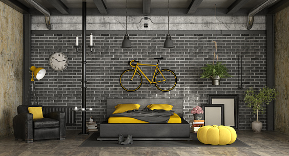 Black and yellow master bedroom in a loft with double bed against brick wall - 3d rendering
Note: the room does not exist in reality, Property model is not necessary