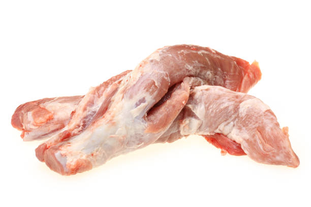 istock Fresh Raw juicy meat isolated on white background 989291500