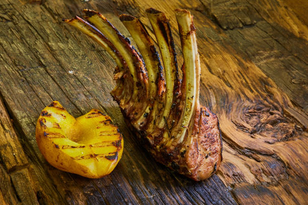 istock Lamb rack with limoncello glaze served on a plate 989291546
