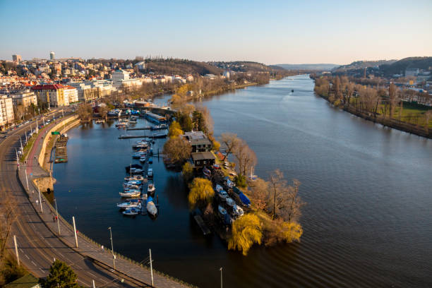 istock Panoramic aerial view to harbour with yachts and scenic spring sunset on Vltava river. 989293542