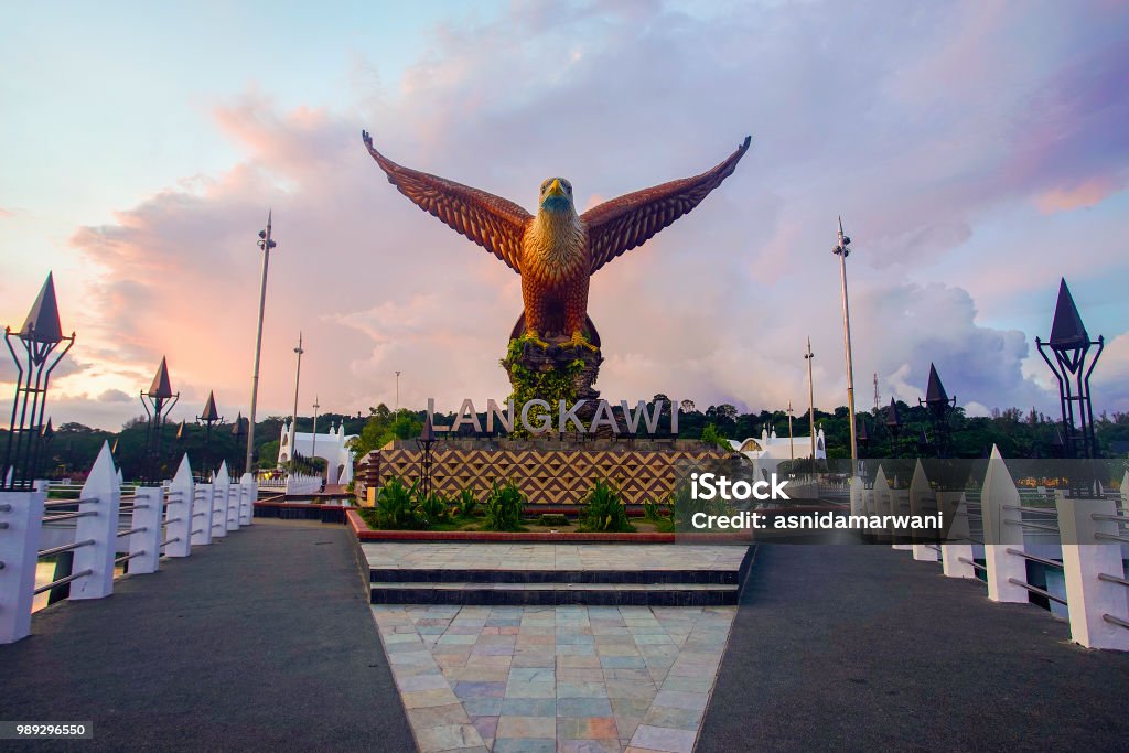 sunset at Eagle Square, Dataran Lang is one of Langkawi’s best known man-made attractions, a large sculpture of an eagle poised to take flight. Beautiful sunset at Eagle Square, Dataran Lang is one of Langkawi’s best known man-made attractions, a large sculpture of an eagle poised to take flight. Pulau Langkawi Stock Photo