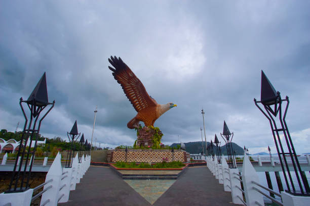 istock Beautiful sunset at Eagle Square, Dataran Lang is one of Langkawi’s best known man-made attractions, a large sculpture of an eagle poised to take flight 989301734