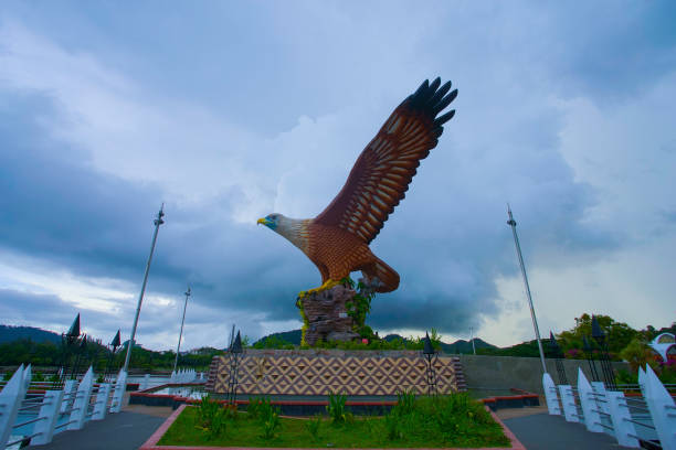 istock Beautiful sunset at Eagle Square, Dataran Lang is one of Langkawi’s best known man-made attractions, a large sculpture of an eagle poised to take flight 989306096