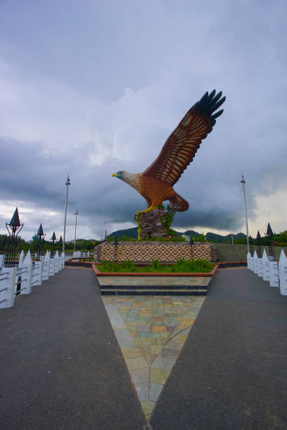 istock Beautiful sunset at Eagle Square, Dataran Lang is one of Langkawi’s best known man-made attractions, a large sculpture of an eagle poised to take flight 989307324