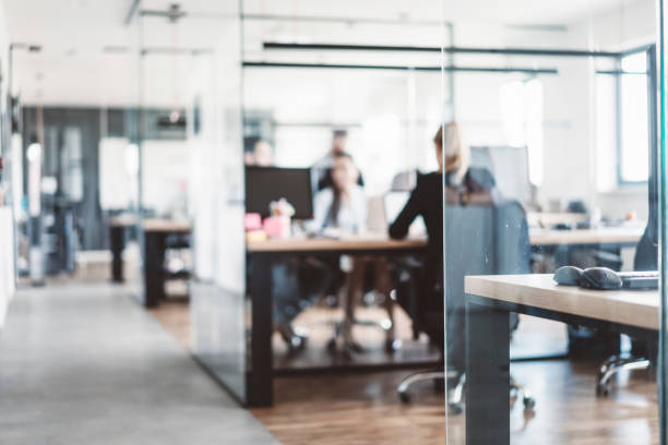istock Blurred picture of a modern office 989311202