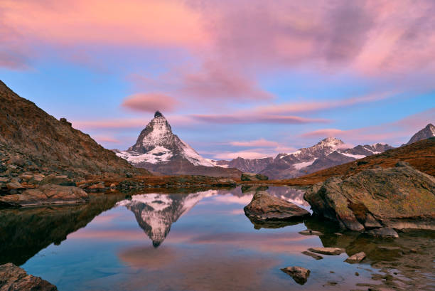 istock Matterhorn at Sunrise in Dramatic Sky, Zermatt, Switzerland 989320024
