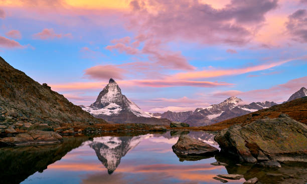 istock Matterhorn at Sunrise in Dramatic Sky, Zermatt, Switzerland 989320078