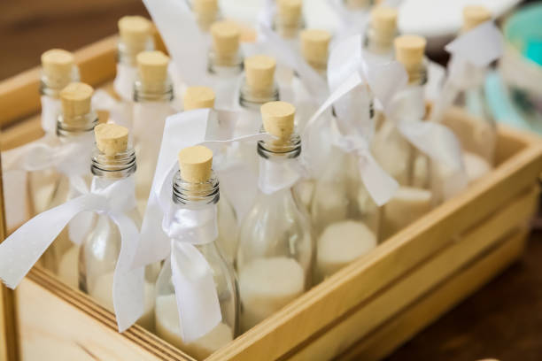istock Small ornamental jars with cork tops and ribbons 989326964