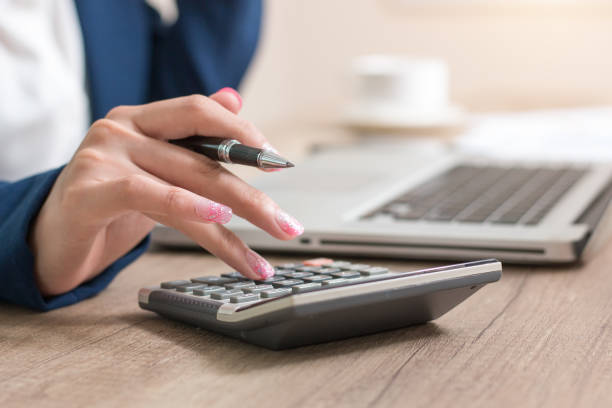 istock Business woman thinking account,accounting 989348806