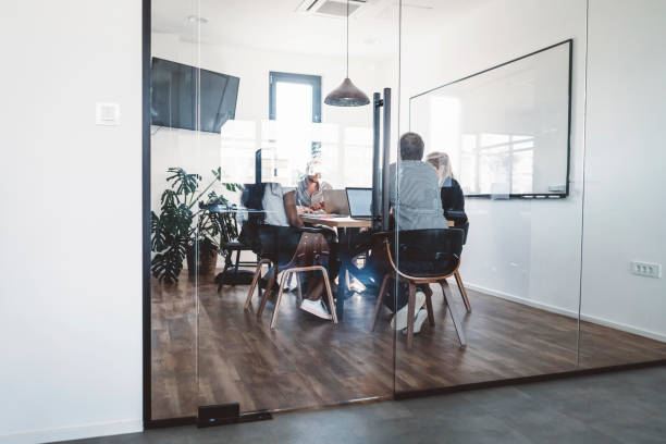 istock We're a small but productive department 989354256