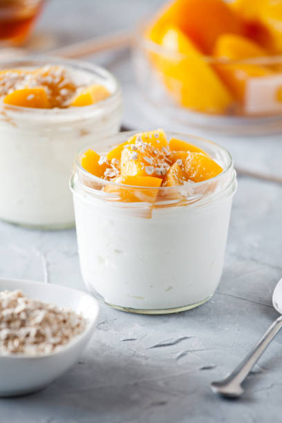 istock Homemade Yogurt With Poached Organic Peach 989358646