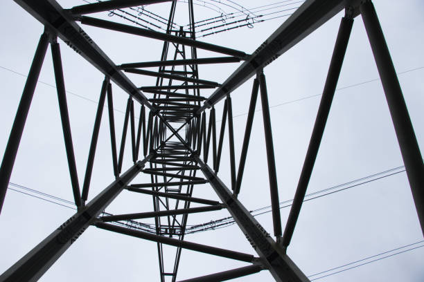 istock Electricity pylons photographed from below 989359014