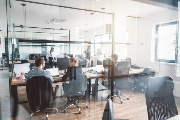 istock A group of business colleagues working in the office 989360598