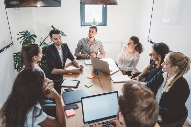 istock Business group congratulating for good presentation 989365052