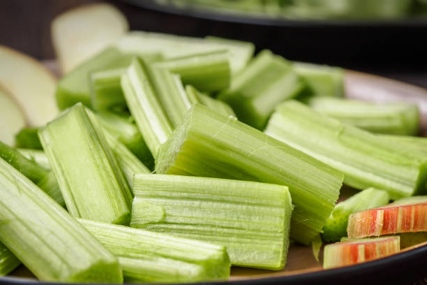 istock Stems of fresh young rhubarb 989369088