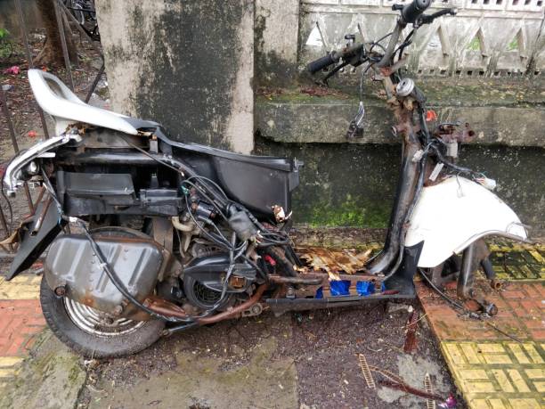 istock Rusted old motorcycle on the ground 989369978