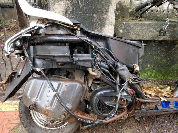 istock Rusted old motorcycle on the ground 989370140