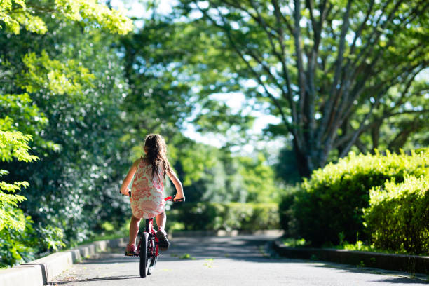 Girl ride a bicycle
