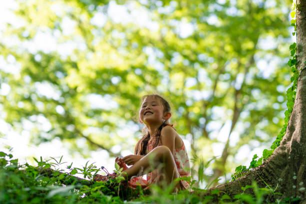 istock Girl playing in the park 989374110