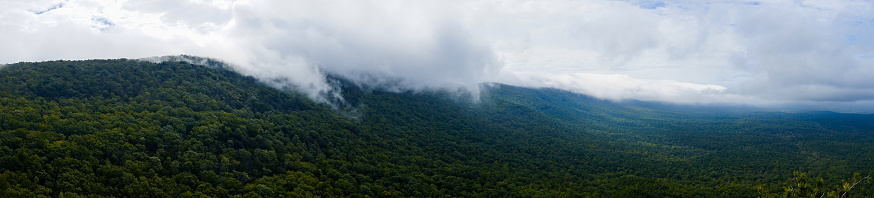 Waves of clouds gliding over the Appalachian mountain range at its southern edge in Alabama.