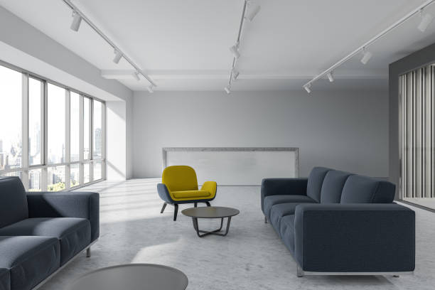 istock Office waiting room, yellow armchairs, reception 989412038