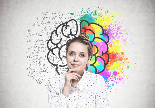 istock Smiling young woman dreaming, creative mind 989414604