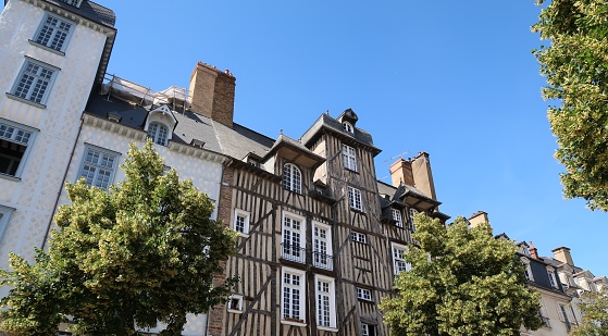 Rennes, France – June 27, 2018: photography showing some half-timbered buildings. The photography was taken from the street of the city of Rennes, France.