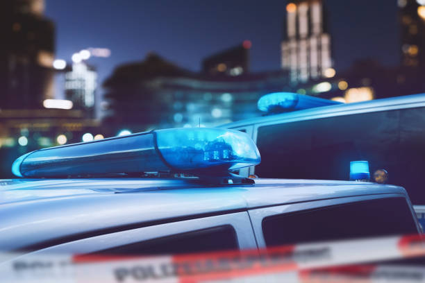 istock Police car in a city 989426818