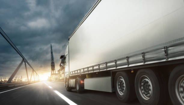 istock Truck delivers over land 989429336