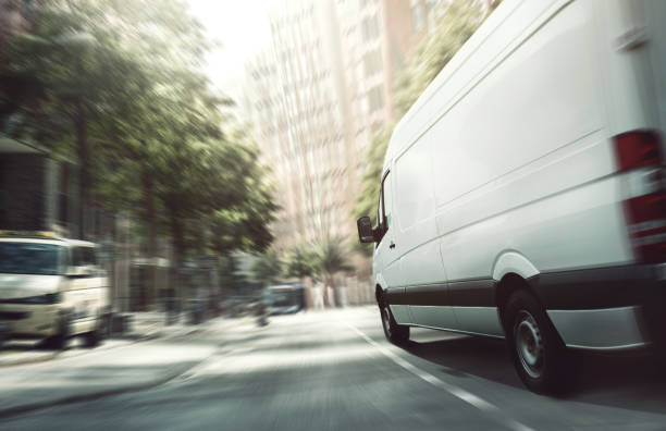istock delivery trucks in the city 989430052