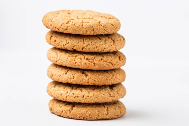 istock Chocolate chip cookies isolated on white background 989442176