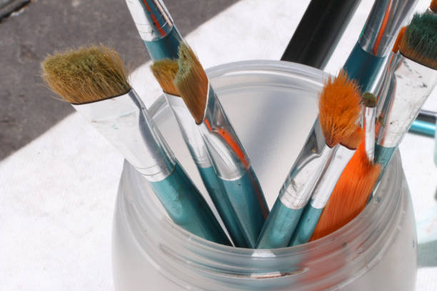 istock bunch of brushes with white mantelpiece 989446972
