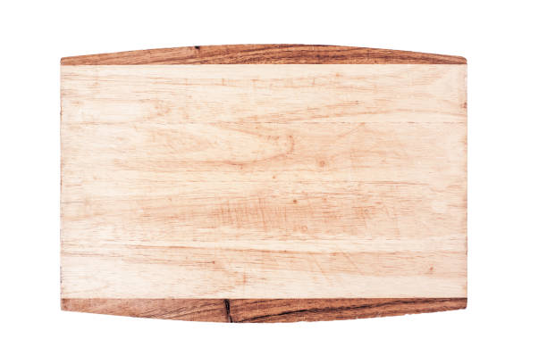 istock Used empty wooden kitchen Board for cutting isolated on white background top view 989447388