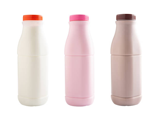 istock Strawberry, chocolate and fresh milk bottles isolated on white with clipping path 989466972