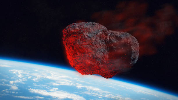 istock Meteor shower, meteorite impact on planet earth (3d science fiction space illustration) 989485152