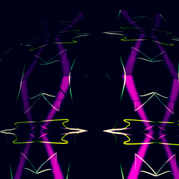 istock Party lights make abstract shapes on black background 989490650