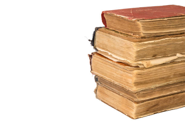 istock A stack of old tattered books with space for text. Vintage torn books 989521510