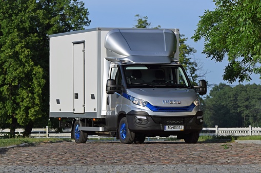 Sobienie, Poland - 10 May, 2018: IVECO Daily in CNG version with insulated container parked on the road. The Daily is one of the most popular commercial vehicles in Europe.