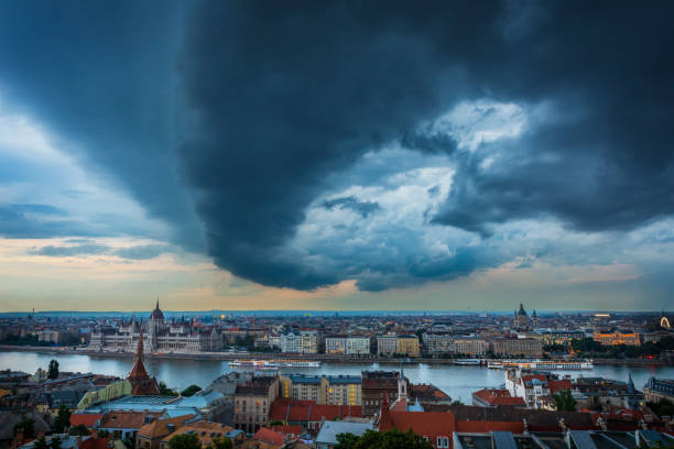 Panoramic view to Budapest Thunderstorm over Budapest Parliament gellert stock pictures, royalty-free photos & images