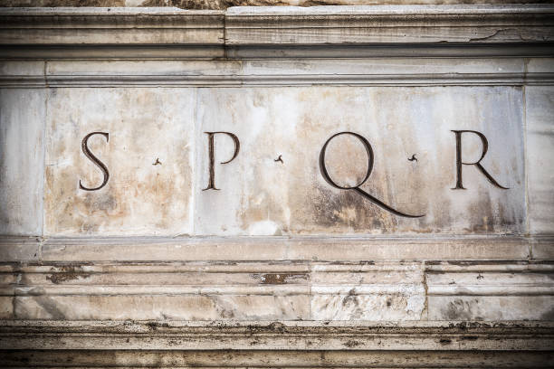 istock Old SPQR engraved on stone in Rome 989569510