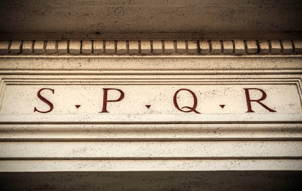 istock Old SPQR engraved on stone in Rome 989569584