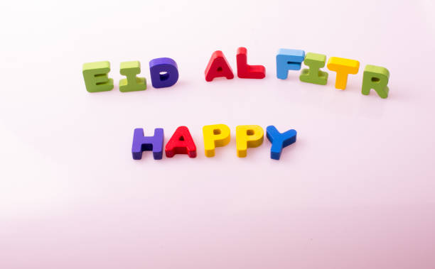 istock the word EID EL FITR  written with colorful letters 989573376