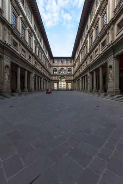 istock Ancient courtyard in a building along the Arno river. 989594450