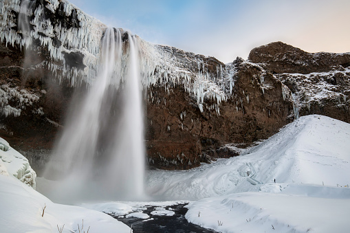 Panorama picture of the famous seldjalandsfoss waterfall in iceland.Sunset picture in the winter