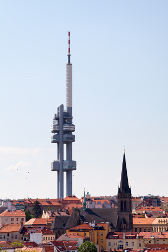 The Žižkov Television Tower and the Church of St. Prokopa in Prague.