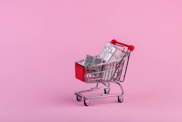 istock Gifts in shopping cart 989659820