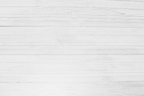istock Empty White Painted Wood Background High Contrast Bright Light Top Angle View 989670000