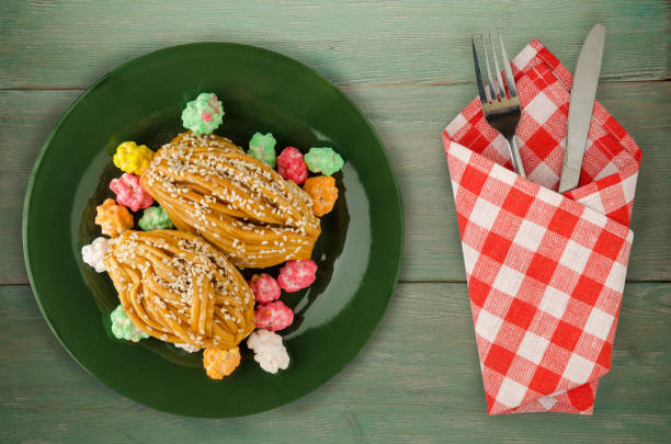 istock cake with sweets on a wooden background . 989714052